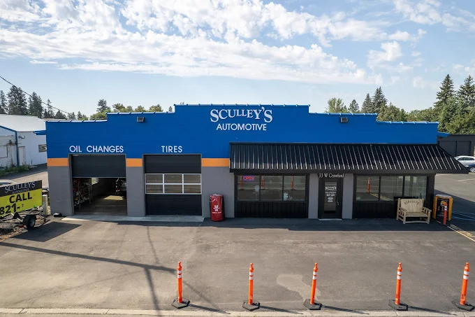 Sculley's Automotive service shop exterior with parking cones.
